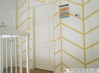 How to Paint a Herringbone Accent Wall at /