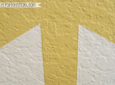 How to Paint a Herringbone Accent Wall at /