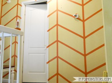 How to Paint a Herringbone Accent Wall at /